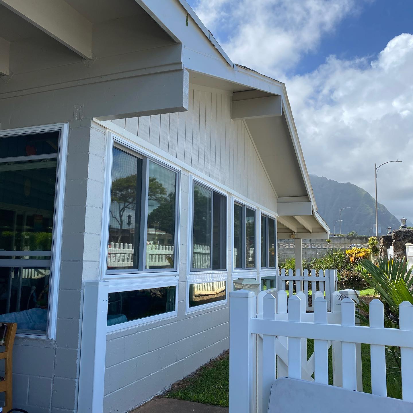 Repainted windward Oahu home against the Ko'olau range